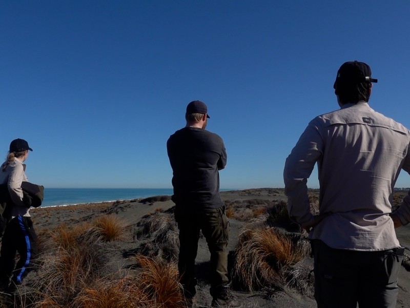 Banks Peninsula Predator Free team standing on Kaitoreti Split