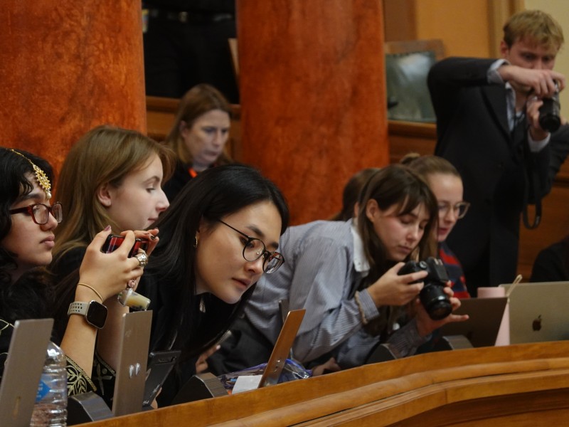 Youth Press Gallery members taking photos. 