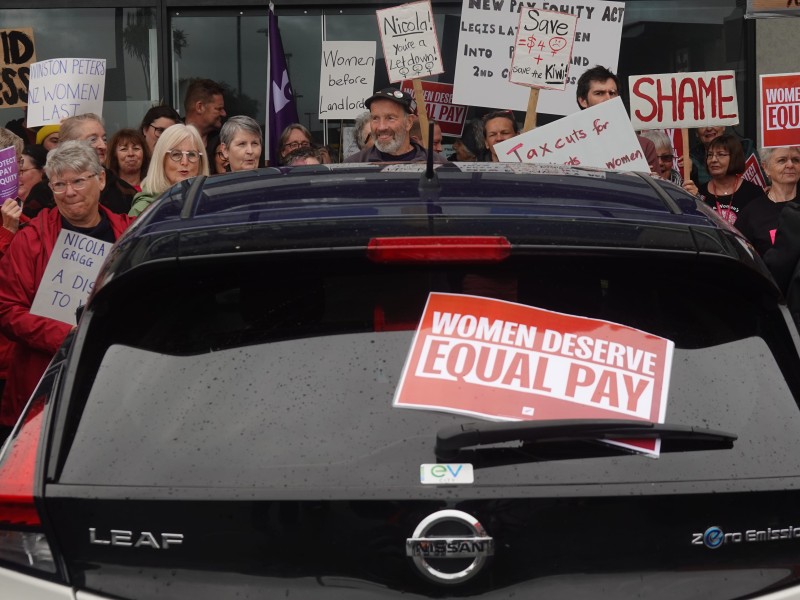 Protest flyer on car back window